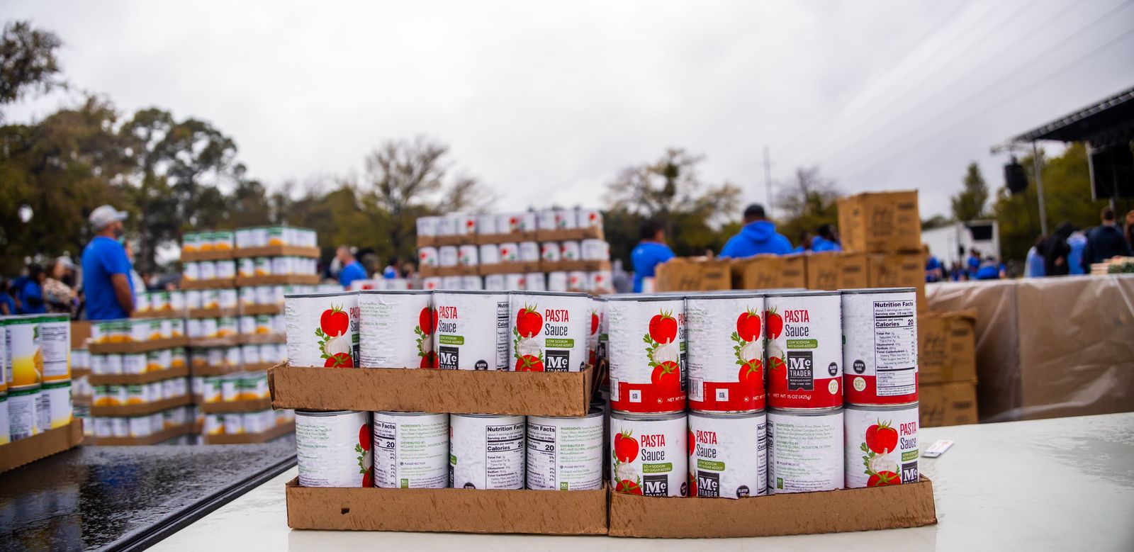 Canned goods organized for a community food drive